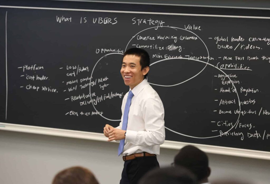 Professor Young Hou teaches Strategy and Analytics in the classroom to MSBA students.